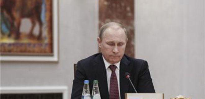 Путин разрешил крымчанам не возвращать долги украинским банкам - Фото