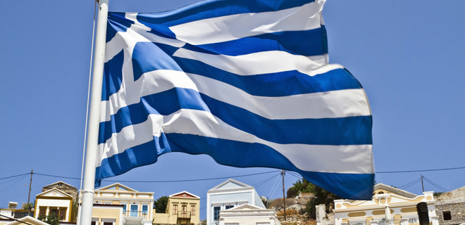 Греция намерена досрочно погасить часть кредита МВФ - Фото